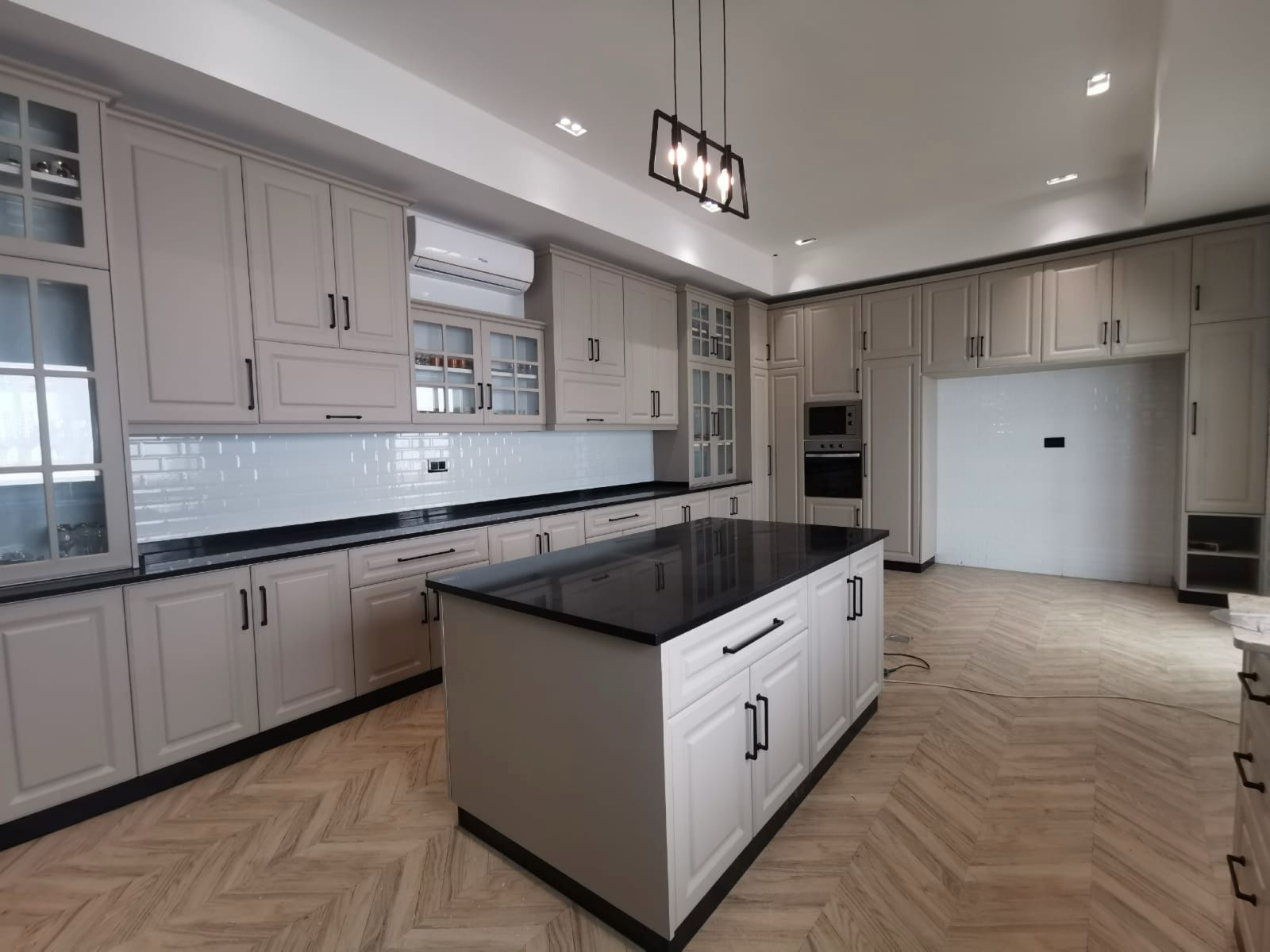 Custom kitchen joinery by Khat Al Barq installed in a UAE villa